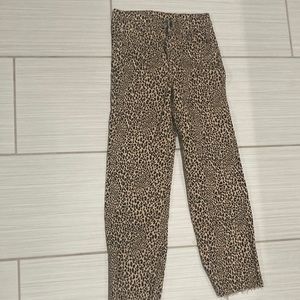 High rise, cheetah print H&M jeans. Good condition.